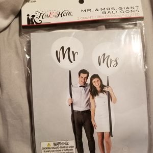 Mr. And Mrs. GIANT balloons.